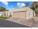 Single-story home featuring a two-car garage and well-maintained front landscaping at 520 W Port Royale Ln, Phoenix, AZ 85023