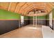 Bonus room showcases an unfinished interior with loft, ladder, and rustic design at 53040 W Whirly Bird Rd, Maricopa, AZ 85139