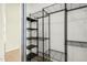 Walk-in closet with an adjustable wire shelving system for storage at 53040 W Whirly Bird Rd, Maricopa, AZ 85139