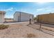 Metal building on a desert lot with a loading container visible in the background at 53040 W Whirly Bird Rd, Maricopa, AZ 85139