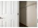 A walk-in closet featuring white walls and wire shelving, ready for organization at 53040 W Whirly Bird Rd, Maricopa, AZ 85139
