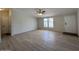 Bright and airy living room with neutral walls and modern hardwood flooring at 538 S 98Th St, Mesa, AZ 85208
