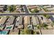 Aerial view of homes with pools, solar panels, and manicured backyards in a vibrant neighborhood at 6121 S Ruby Dr, Chandler, AZ 85249