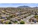 Expansive aerial view of a residential community with desert landscaping and mountain views at 6121 S Ruby Dr, Chandler, AZ 85249