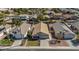 Aerial view showcasing the layout of houses, green spaces, and neighborhood streets in the Sun Groves Community at 6121 S Ruby Dr, Chandler, AZ 85249
