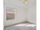Bedroom with carpet and a bright window at 6121 S Ruby Dr, Chandler, AZ 85249