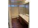 Bathroom featuring a shower-tub combo and a vanity with a sink at 6531 W Hess S St, Phoenix, AZ 85043