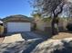 Single-story home with desert landscaping, a two-car garage, and neutral exterior paint at 6531 W Hess S St, Phoenix, AZ 85043