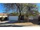 Charming single-story home with a well-maintained front yard and a two-car garage at 6531 W Hess S St, Phoenix, AZ 85043