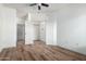 Spacious bedroom with wood floors that leads to bathroom and closet at 7101 W Beardsley Rd # 722, Glendale, AZ 85308