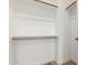 Walk-in closet with shelves and metal hanging rods at 7101 W Beardsley Rd # 722, Glendale, AZ 85308