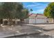 Charming single-story home with a well-manicured front yard and a three-car garage at 721 W Cherrywood Dr, Chandler, AZ 85248