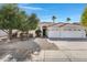 Charming single-story home with a three-car garage, low-maintenance landscaping, and a beautiful tile roof at 721 W Cherrywood Dr, Chandler, AZ 85248