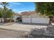 Lovely home featuring a spacious driveway, three-car garage, and desert-friendly landscaping at 721 W Cherrywood Dr, Chandler, AZ 85248