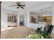 Open living room with views to kitchen, dining area, and patio at 721 W Cherrywood Dr, Chandler, AZ 85248