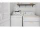 Functional laundry room with washer and dryer, and shelving at 7558 N Via De La Luna --, Scottsdale, AZ 85258