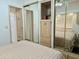 Bedroom featuring a mirrored closet and a comfortable bed at 7750 E Broadway Rd # 814, Mesa, AZ 85208