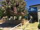Entrance to the clubhouse features professional landscaping and beautiful entryway at 7750 E Broadway Rd # 814, Mesa, AZ 85208