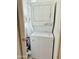 Laundry area with a stacked washer and dryer at 7750 E Broadway Rd # 814, Mesa, AZ 85208