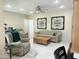 Comfortable living room with a ceiling fan and tile flooring, offering a relaxing atmosphere at 7750 E Broadway Rd # 814, Mesa, AZ 85208