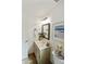 Traditional bathroom with tiled floor, hardwood vanity and framed mirror at 10318 E Spring Creek Rd, Sun Lakes, AZ 85248