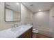 Clean bathroom with a vanity and a shower-tub combo, providing all the necessary amenities at 12222 N Paradise Village S Pkwy # 224, Phoenix, AZ 85032