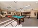 Fun game room featuring a pool table, ping pong table, and comfortable seating at 12222 N Paradise Village S Pkwy # 224, Phoenix, AZ 85032