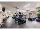 Well-equipped gym with treadmills, elliptical machines, and various weight training equipment at 12222 N Paradise Village S Pkwy # 224, Phoenix, AZ 85032