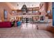 Open lobby area with tile flooring, stylish furniture, and plenty of natural light at 12222 N Paradise Village S Pkwy # 224, Phoenix, AZ 85032