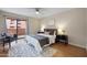 Bright and airy main bedroom with a balcony, creating a cozy and relaxing space at 12222 N Paradise Village S Pkwy # 224, Phoenix, AZ 85032