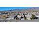 Scenic aerial view of a residential area nestled near the mountains with well-maintained homes at 12330 E Crystal Frst, Gold Canyon, AZ 85118