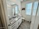Bathroom features a granite countertop, large mirror, and ample natural light from the window at 12330 E Crystal Frst, Gold Canyon, AZ 85118