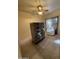 Cozy bedroom featuring neutral carpet, a ceiling fan, and natural light at 1302 E Tierra Buena Ln, Phoenix, AZ 85022