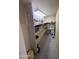 Walk-in pantry with ample shelving and storage space, ideal for keeping your kitchen organized at 1302 E Tierra Buena Ln, Phoenix, AZ 85022