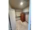 Walk-in closet featuring built-in shelving and ample storage for an organized wardrobe at 1302 E Tierra Buena Ln, Phoenix, AZ 85022