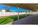 Covered patio overlooking the artificial turf and low-maintenance gravel yard at 1322 S Oracle --, Mesa, AZ 85204