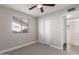 Bedroom with a closet and an entry doorway to another room at 1322 S Oracle --, Mesa, AZ 85204