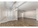 Open dining room floor plan concept with wood-look floors and white trim at 1322 S Oracle --, Mesa, AZ 85204