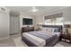 Cozy main bedroom featuring a ceiling fan and a large window at 1322 S Oracle --, Mesa, AZ 85204