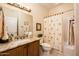 The bathroom is equipped with a granite countertop, a vanity, and a shower and tub at 13434 W El Sueno Ct, Sun City West, AZ 85375