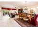 Open concept living space with living and dining areas offering seamless flow at 13434 W El Sueno Ct, Sun City West, AZ 85375