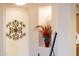 Close-up of decorative wall niche with accent lighting and floral arrangement at 13434 W El Sueno Ct, Sun City West, AZ 85375