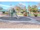 Community playground with slide, playhouse, and picnic area for Gathering enjoyment at 1550 N Stapley Dr # 31, Mesa, AZ 85203