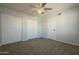 Spacious bedroom with double closets, neutral carpet, and ample storage space at 15801 N 29Th St # 11, Phoenix, AZ 85032