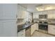 Kitchen with stainless steel appliances and black countertops at 15801 N 29Th St # 11, Phoenix, AZ 85032