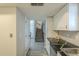 Charming kitchen featuring modern appliances, granite countertops, and staircase access at 15801 N 29Th St # 11, Phoenix, AZ 85032