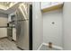 View of a kitchen boasting stainless steel appliances, ample cabinet space, and vinyl floors at 15801 N 29Th St # 11, Phoenix, AZ 85032