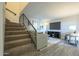 Living room view showcasing staircase, stylish furnishings, and decor at 15801 N 29Th St # 11, Phoenix, AZ 85032