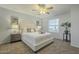 Inviting main bedroom showcasing a ceiling fan, window view, and a serene atmosphere at 15801 N 29Th St # 11, Phoenix, AZ 85032