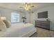 Comfortable main bedroom with natural light, ample space, and contemporary furnishings at 15801 N 29Th St # 11, Phoenix, AZ 85032